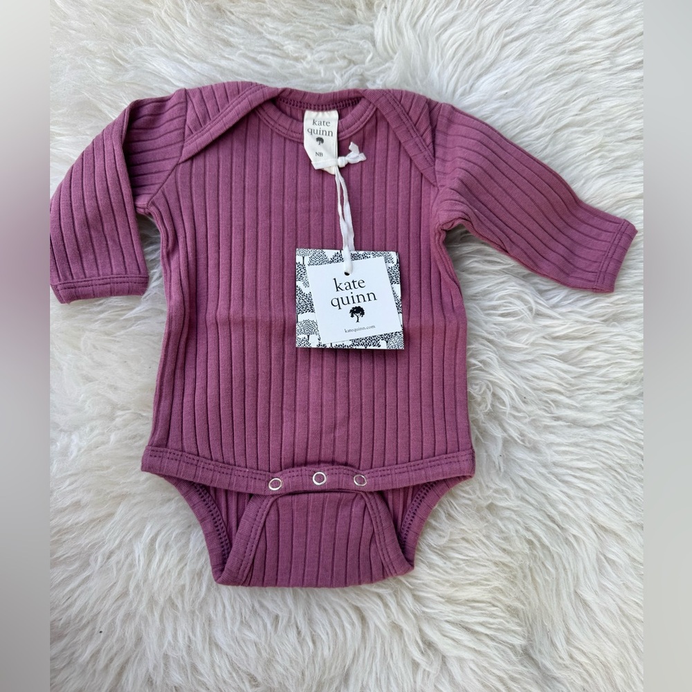 Kate Quinn onesie